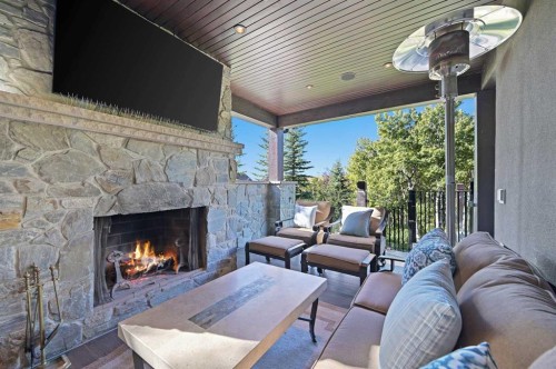 31 Spring Valley Heights Sw, Calgary, AB -  With Fireplace With Deck Patio Veranda With Exterior