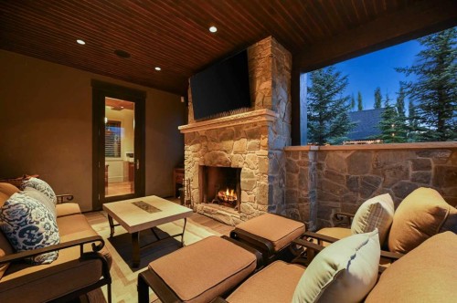 31 Spring Valley Heights Sw, Calgary, AB - Outdoor With Fireplace With Deck Patio Veranda With Exterior