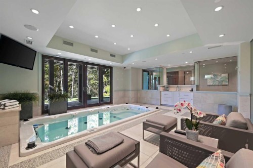 31 Spring Valley Heights Sw, Calgary, AB - Indoor Photo Showing Other Room With In Ground Pool