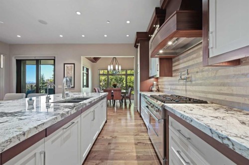 31 Spring Valley Heights Sw, Calgary, AB - Indoor Photo Showing Kitchen With Double Sink With Upgraded Kitchen