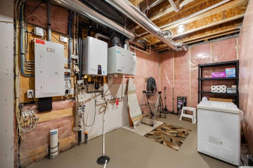 84 Riviera Court, Cochrane, AB - Indoor Photo Showing Basement