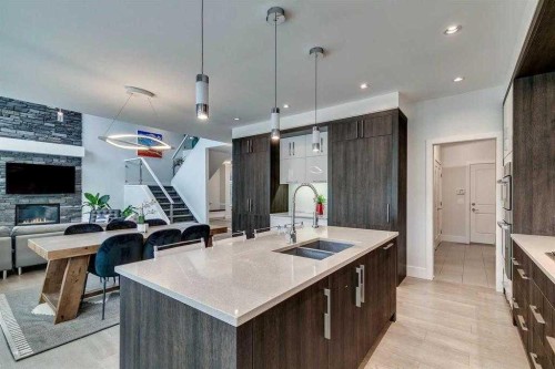 86 West Point Mews Sw, Calgary, AB - Indoor Photo Showing Kitchen With Double Sink With Upgraded Kitchen