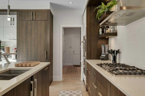 86 West Point Mews Sw, Calgary, AB - Indoor Photo Showing Kitchen With Double Sink