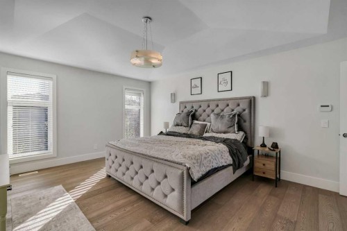 86 West Point Mews Sw, Calgary, AB - Indoor Photo Showing Bedroom