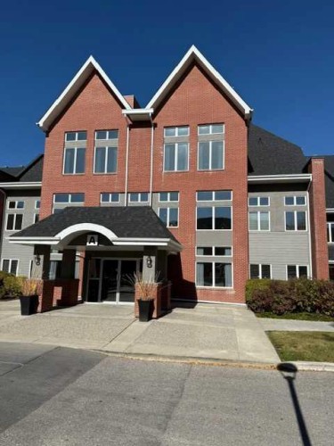 203-15 Everstone Drive Sw, Calgary, AB - Outdoor With Facade