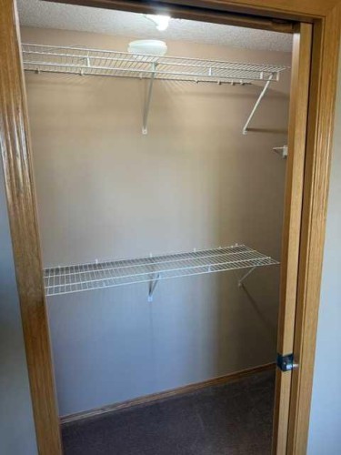203-15 Everstone Drive Sw, Calgary, AB - Indoor With Storage