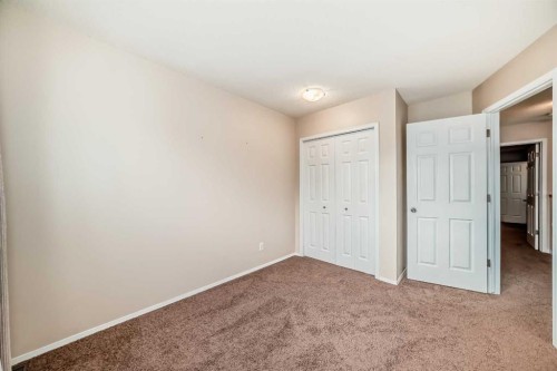 17 Kingsland Court Sw, Calgary, AB - Indoor Photo Showing Other Room