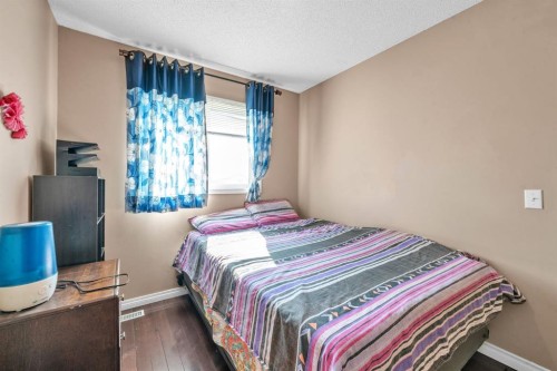 18 Martinvalley Way Ne, Calgary, AB - Indoor Photo Showing Bedroom