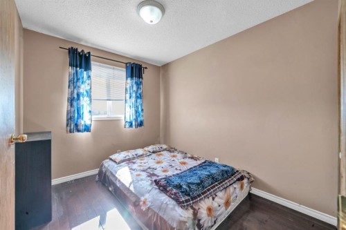 18 Martinvalley Way Ne, Calgary, AB - Indoor Photo Showing Bedroom