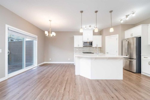 243 Kinniburgh Road, Chestermere, AB - Indoor Photo Showing Kitchen With Stainless Steel Kitchen With Upgraded Kitchen