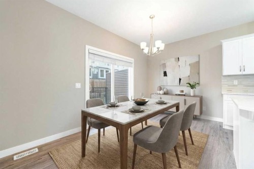 243 Kinniburgh Road, Chestermere, AB - Indoor Photo Showing Dining Room