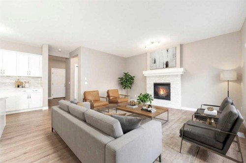 243 Kinniburgh Road, Chestermere, AB - Indoor Photo Showing Living Room With Fireplace