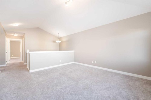 243 Kinniburgh Road, Chestermere, AB - Indoor Photo Showing Other Room