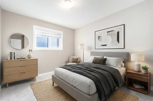 243 Kinniburgh Road, Chestermere, AB - Indoor Photo Showing Bedroom