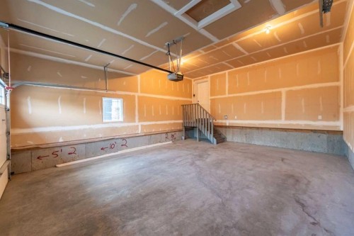 243 Kinniburgh Road, Chestermere, AB - Indoor Photo Showing Garage