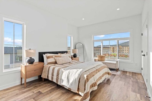 112-156 Park Street, Cochrane, AB - Indoor Photo Showing Bedroom