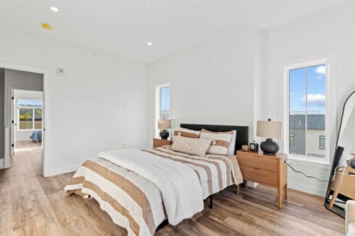 112-156 Park Street, Cochrane, AB - Indoor Photo Showing Bedroom