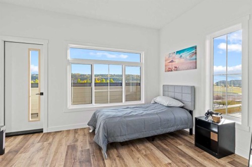 112-156 Park Street, Cochrane, AB - Indoor Photo Showing Bedroom