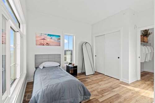 112-156 Park Street, Cochrane, AB - Indoor Photo Showing Bedroom