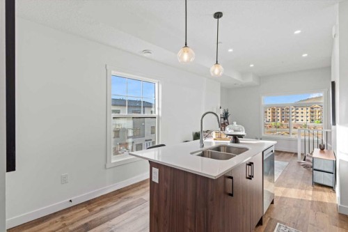 112-156 Park Street, Cochrane, AB - Indoor Photo Showing Kitchen With Double Sink With Upgraded Kitchen