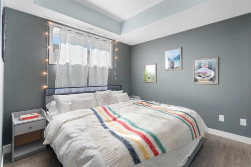 1104-2461 Baysprings Link Sw, Airdrie, AB - Indoor Photo Showing Bedroom
