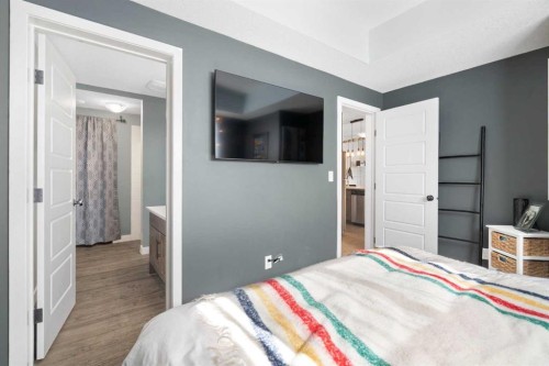 1104-2461 Baysprings Link Sw, Airdrie, AB - Indoor Photo Showing Bedroom