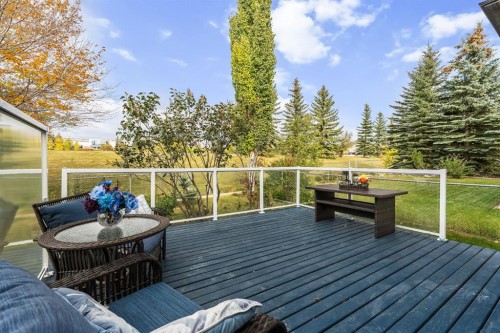 120 Simcoe Close Sw, Calgary, AB - Outdoor With Deck Patio Veranda With Exterior
