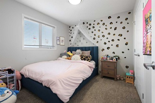 71 Masters Heights Se, Calgary, AB - Indoor Photo Showing Bedroom