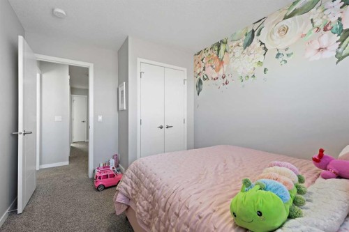 71 Masters Heights Se, Calgary, AB - Indoor Photo Showing Bedroom