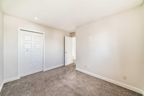 120 Martinview Close Ne, Calgary, AB - Indoor Photo Showing Other Room