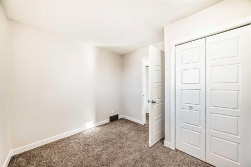120 Martinview Close Ne, Calgary, AB - Indoor Photo Showing Other Room