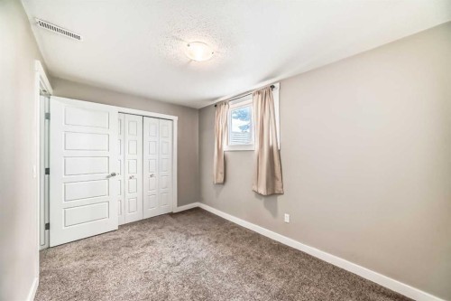120 Martinview Close Ne, Calgary, AB - Indoor Photo Showing Other Room