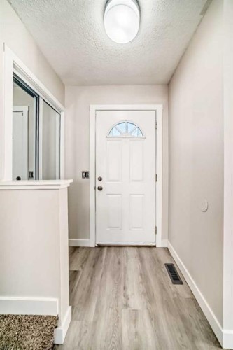 120 Martinview Close Ne, Calgary, AB - Indoor Photo Showing Other Room