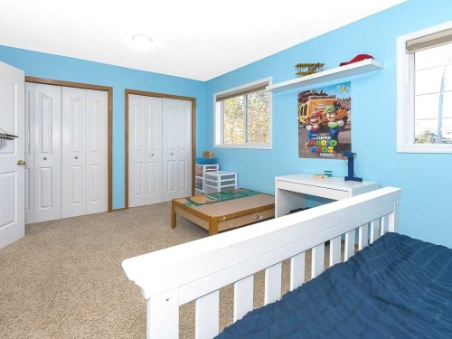 119 Mt Douglas Manor Se, Calgary, AB - Indoor Photo Showing Bedroom