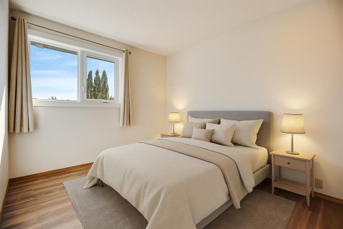 107 Wood Valley Drive Sw, Calgary, AB - Indoor Photo Showing Bedroom
