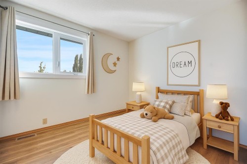 107 Wood Valley Drive Sw, Calgary, AB - Indoor Photo Showing Bedroom