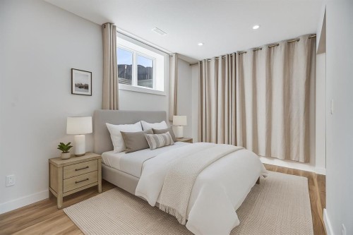 107 Wood Valley Drive Sw, Calgary, AB - Indoor Photo Showing Bedroom