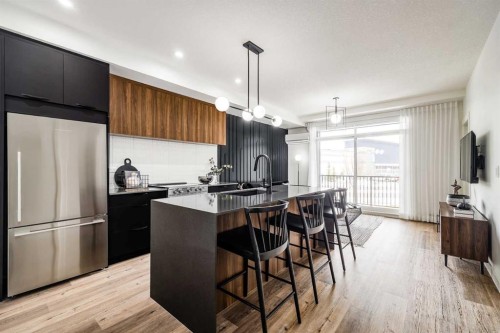 1313-14910 1 Street Nw, Calgary, AB - Indoor Photo Showing Kitchen With Stainless Steel Kitchen With Upgraded Kitchen