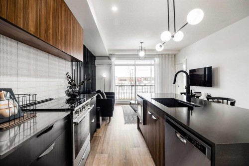 1313-14910 1 Street Nw, Calgary, AB - Indoor Photo Showing Kitchen With Upgraded Kitchen