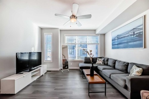 8-138 Seton Passage Se, Calgary, AB - Indoor Photo Showing Living Room