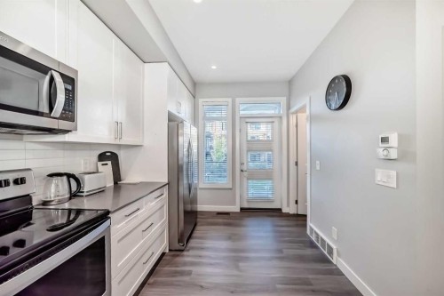 8-138 Seton Passage Se, Calgary, AB - Indoor Photo Showing Kitchen
