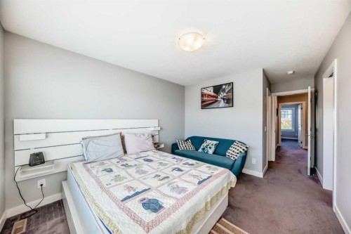 8-138 Seton Passage Se, Calgary, AB - Indoor Photo Showing Bedroom
