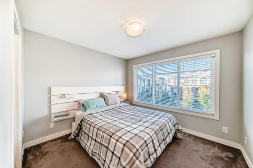 8-138 Seton Passage Se, Calgary, AB - Indoor Photo Showing Bedroom