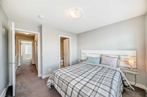 8-138 Seton Passage Se, Calgary, AB - Indoor Photo Showing Bedroom