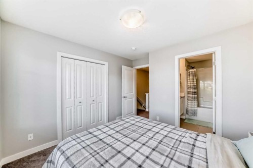 8-138 Seton Passage Se, Calgary, AB - Indoor Photo Showing Bedroom