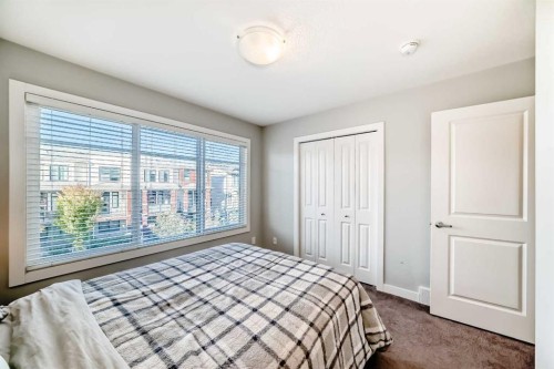 8-138 Seton Passage Se, Calgary, AB - Indoor Photo Showing Bedroom