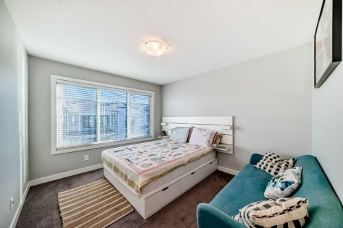 8-138 Seton Passage Se, Calgary, AB - Indoor Photo Showing Bedroom