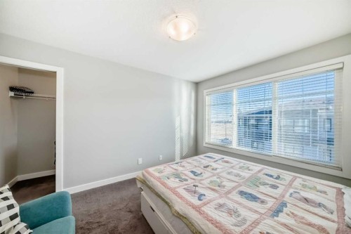 8-138 Seton Passage Se, Calgary, AB - Indoor Photo Showing Bedroom