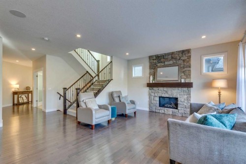 522 Mahogany Manor Se, Calgary, AB - Indoor Photo Showing Living Room With Fireplace