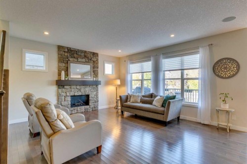 522 Mahogany Manor Se, Calgary, AB - Indoor Photo Showing Living Room With Fireplace